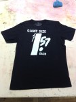 T-shirt with "Giant Size $1.57 Each" design